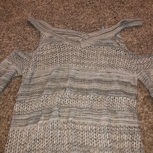 a knitted long sleeve sweater